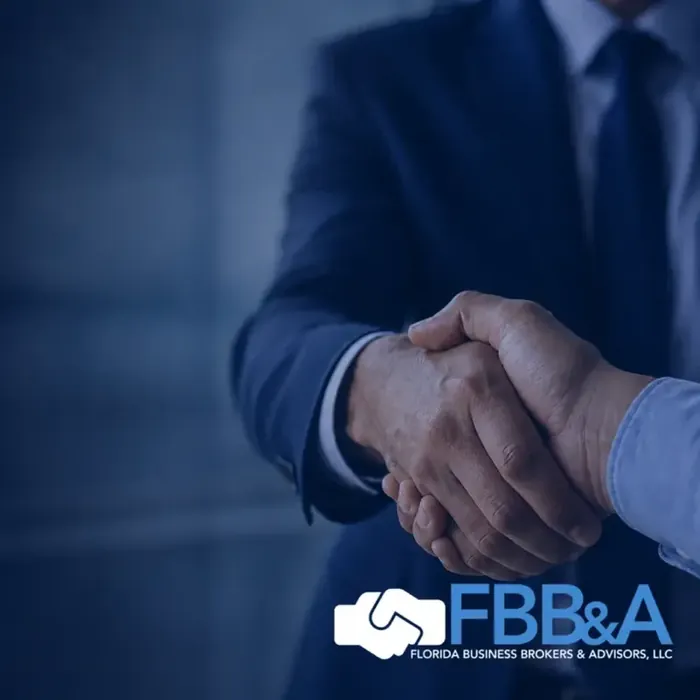 Florida business brokers shaking hands on a completed business sale